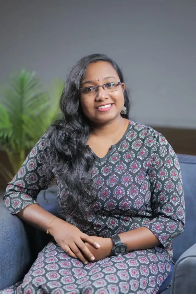 best freelance digital marketer in kochi in a blue sofa